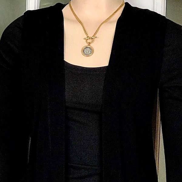 Bbeni lion coin in holder curb toggle chain necklace