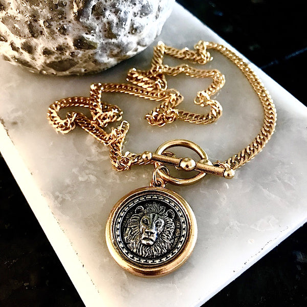 Bbeni gold and silver lion coin toggle necklace