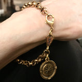 Compass charm on a heavy link  bracelet