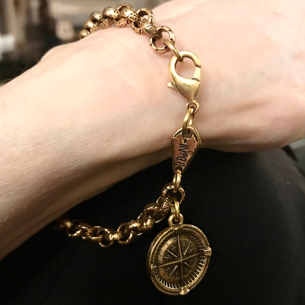 Compass charm on a heavy link  bracelet