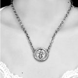 fleur de lis coin necklace