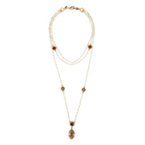 Aviela long pearl marquis cross layered necklace