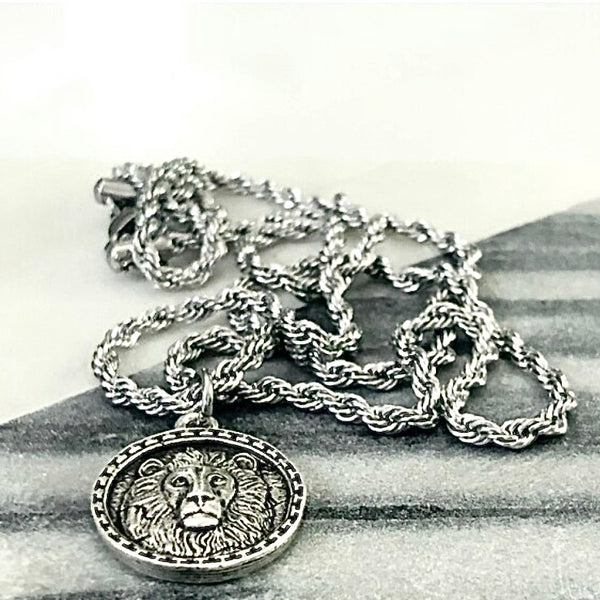Gold or silver lion coin on rope chain