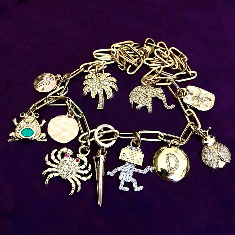 From the Dawn of Man to Alex and Ani, Charm Jewelry is Still Loved