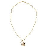 Gold and diamond cz coin and cross necklace 