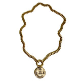 Gold coin necklace on heavy cable chain
